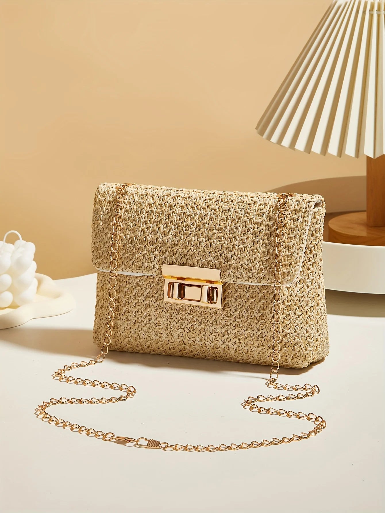 Woven straw shoulder bag