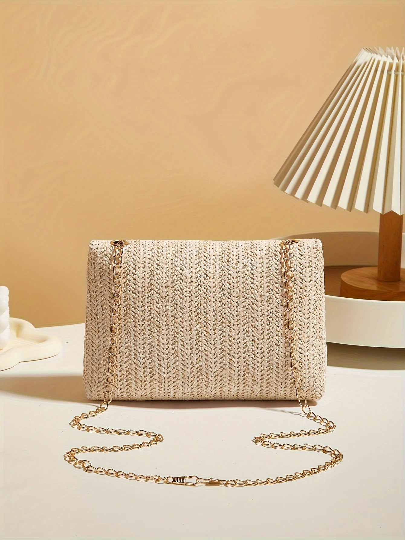 Woven straw shoulder bag
